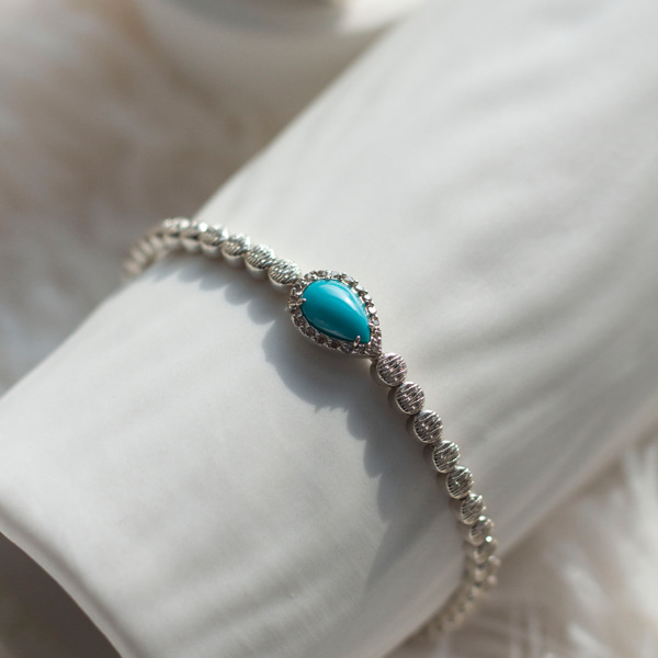 Pear cabochon turquoise cognac diamond bracelet